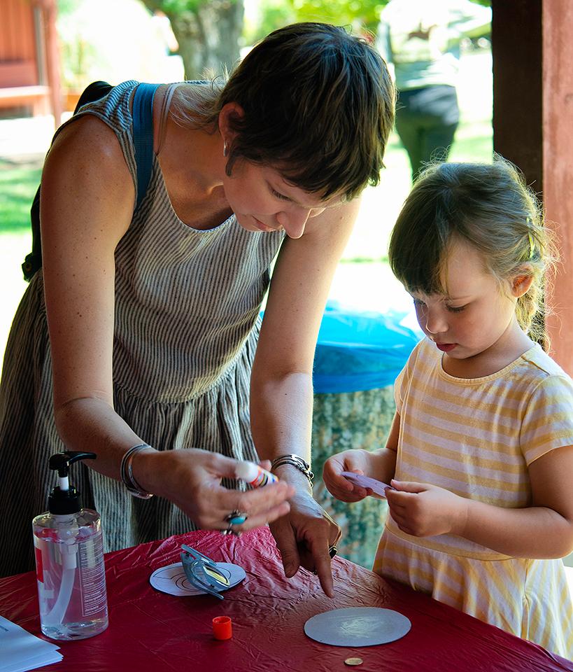 Mother and child working on a craft project at Rancho Los Alamitos.
