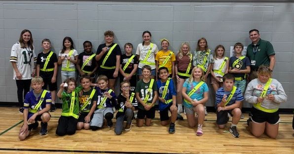 students with their safety patrol vests