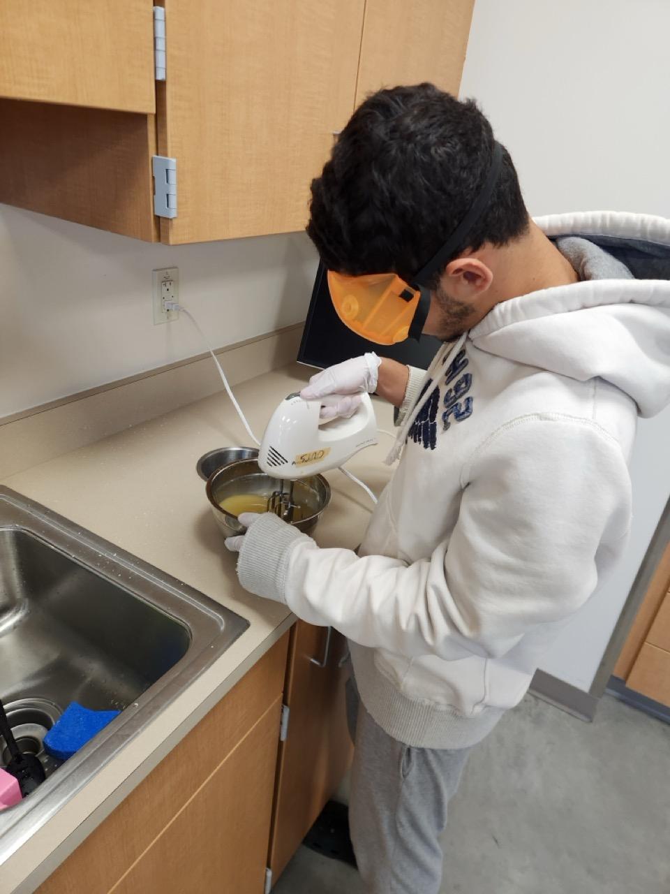 student making soap