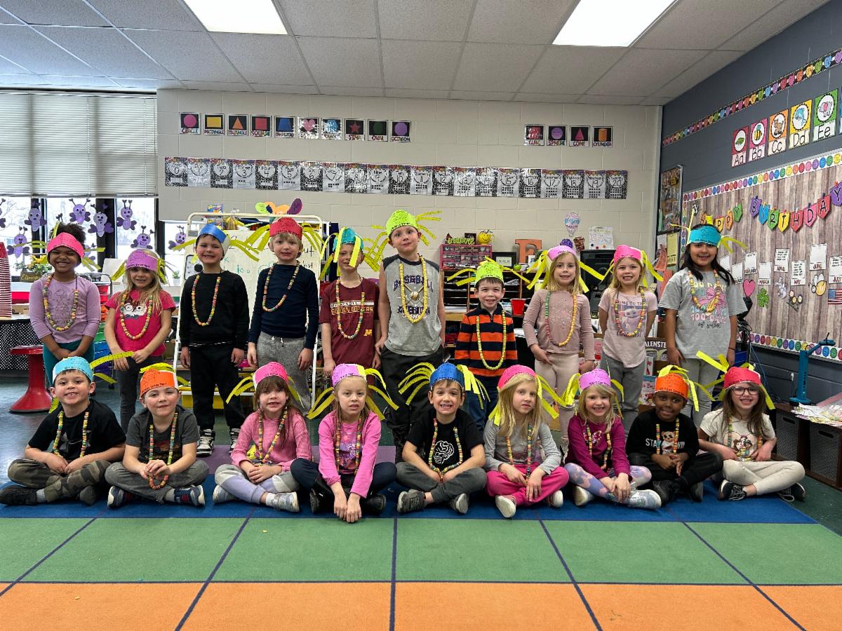 a group of students dressed up for 100 day of school celebration