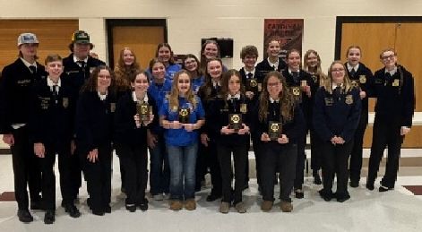 students standing with awards