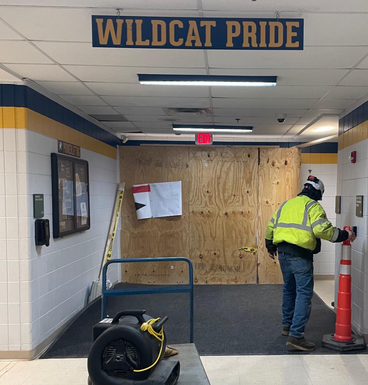 boarded up entrance door