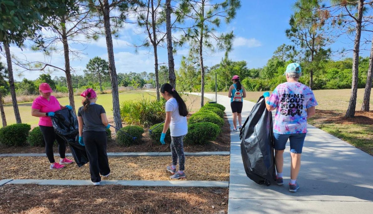 volunteers picking up trash