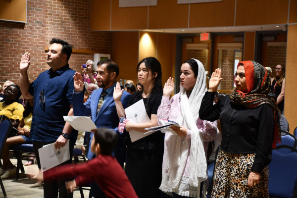 People at Vienna's naturalization  ceremony