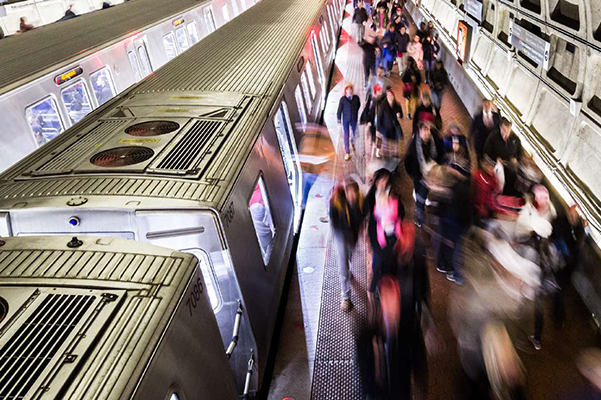 Photo of riders getting off a Metrorail train