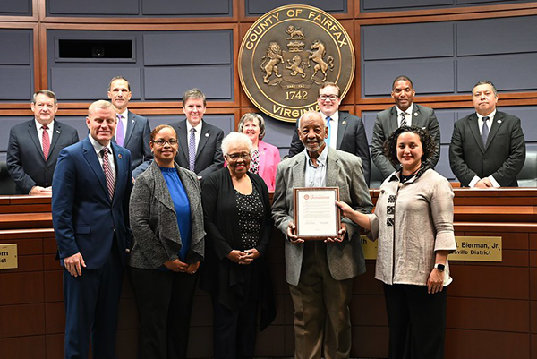 Supervisor Walter Alcorn recognizes Joe Heastie with a proclamation for his service on the Commission for Aging