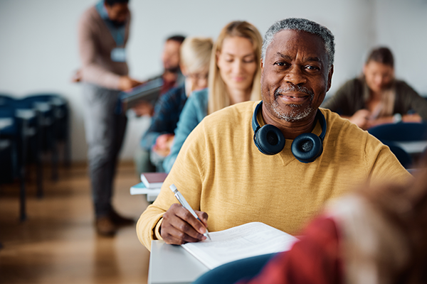 A senior citizen in the classroom