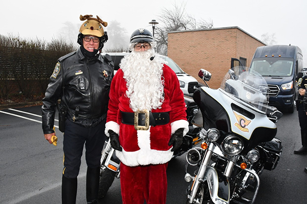 Vienna Police officer with Santa
