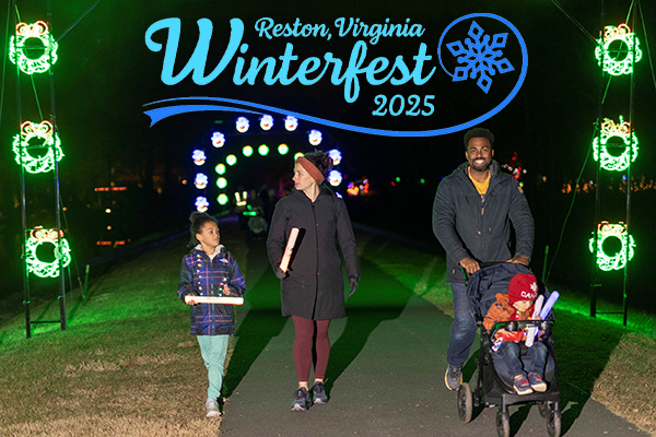 A family strolling through Winterfest