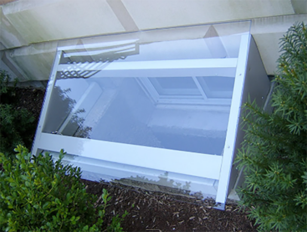A window well cover to prevent flooding