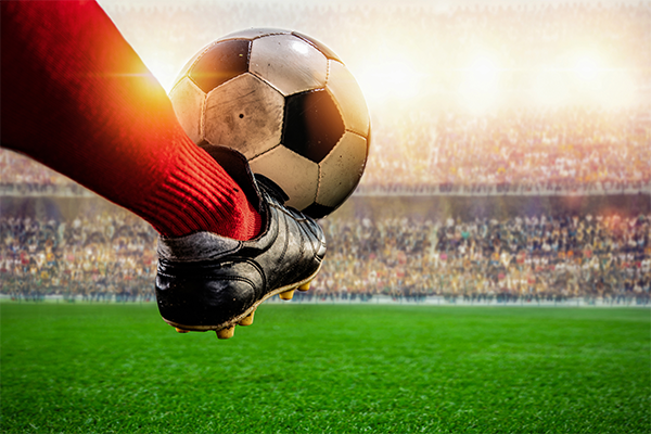 Kicking a soccer ball