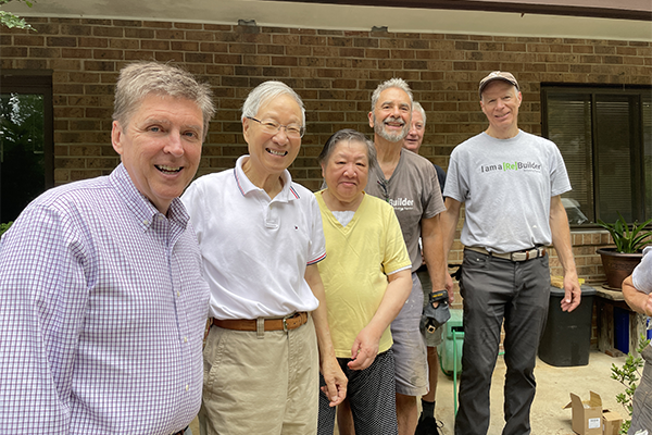 Fairfax County Supervisor Walter Alcorn with Rebuilding Together volunteers