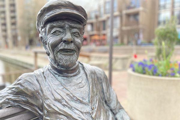 Bronze sculpture of Bob Simon at Lake Anne