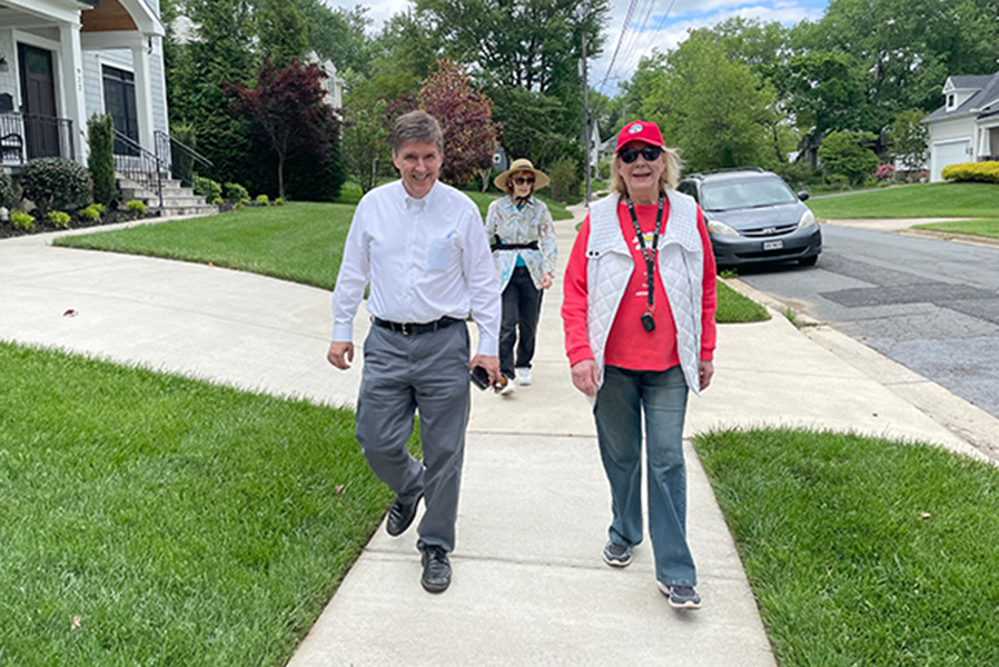 Fairfax County Supervisor Walter Alcorn walking with the Shepherd Center's weekly walking club.