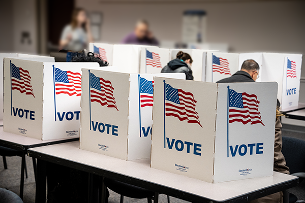 Photo of voters casting their ballots in Fairfax County