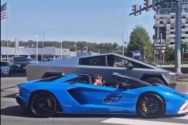 An illegal street race between a Lamborghini and Cybertruck in Tysons