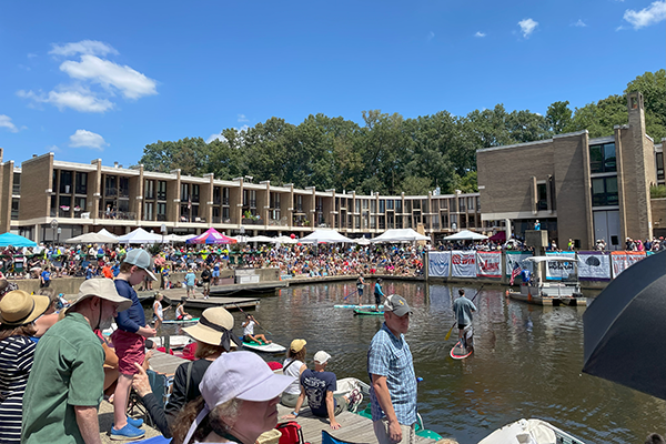 Spectators at the Carboard Boat Regatta on Lake Anne