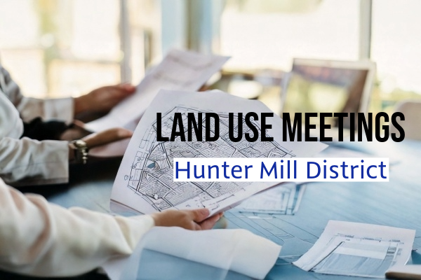A photo of man reviewing land use plans