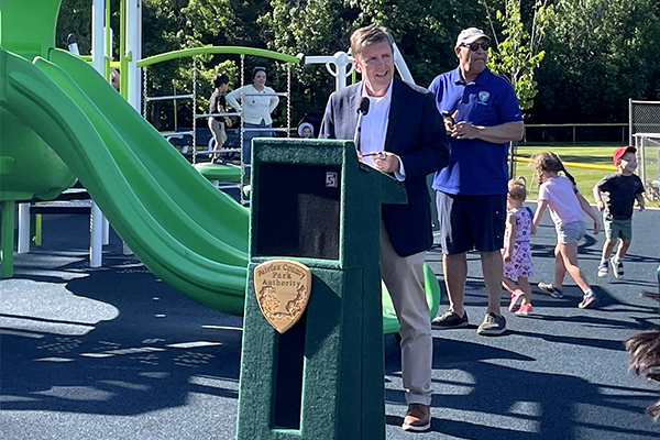 Fairfax County Supervisor Walter Alcorn speaking at Reston North Playground ribbon cutting