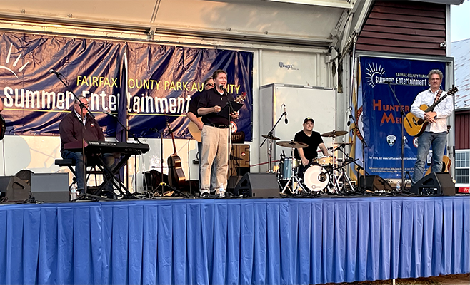 Fairfax County Supervisor Walter Alcorn speaking at the Hunter MIll Melodies