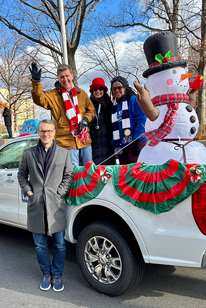 Fairfax County Supervisor Walter Alcorn with Congressman Walkinshaw, Senator Boysko and Delegate Keys-Gamarra at the Reston Holiday Parade