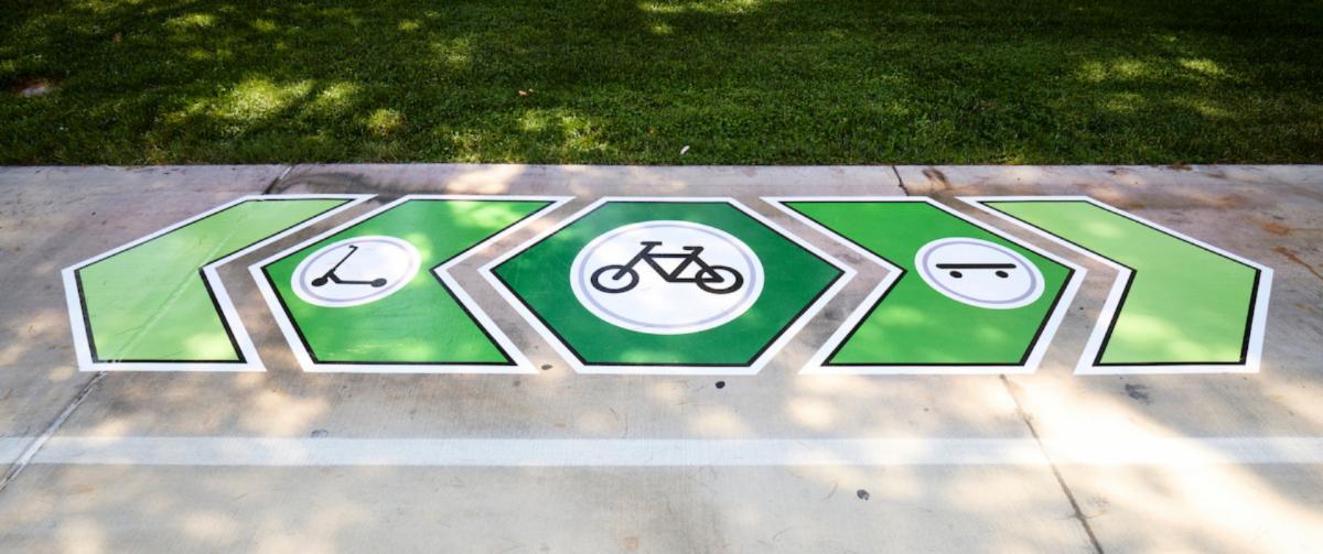 Rebel Route signage painted on the ground. Photo credit: Josh Hawkins
