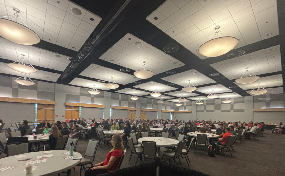 Tables full of Business Affairs employees in the SU ballroom