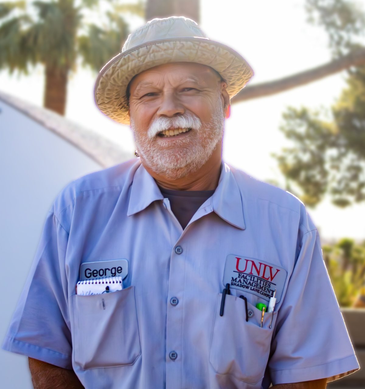 George Ebner, Shadow Lane Facilities Management at UNLV in a blue colored shirt and straw hat