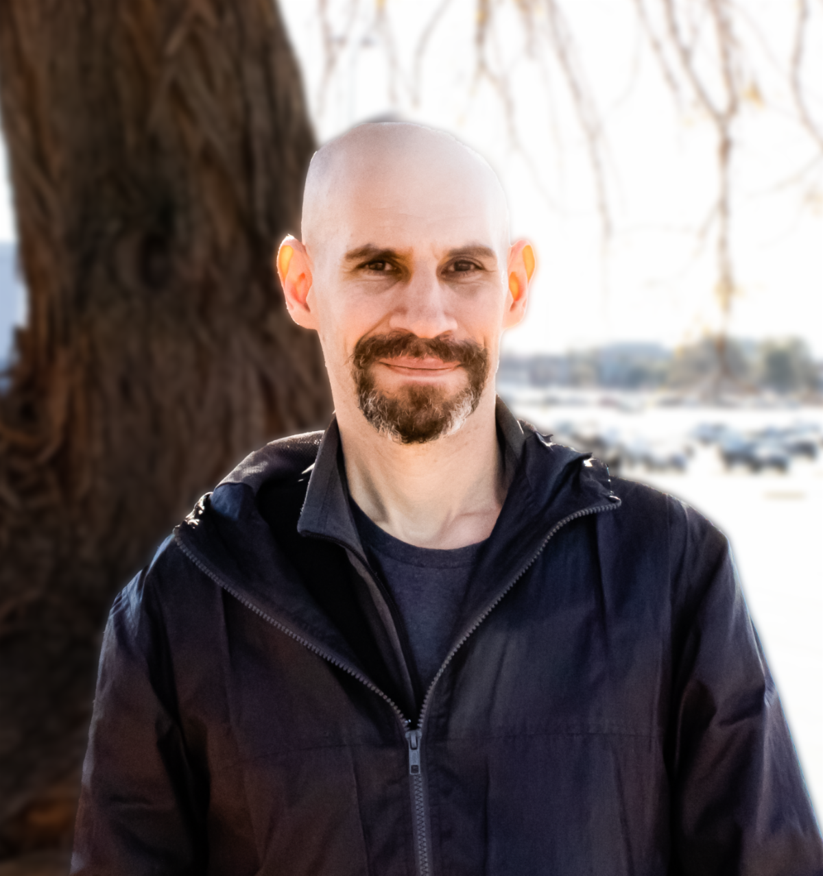 Photo of Craig Topple standing outside of the CSB building