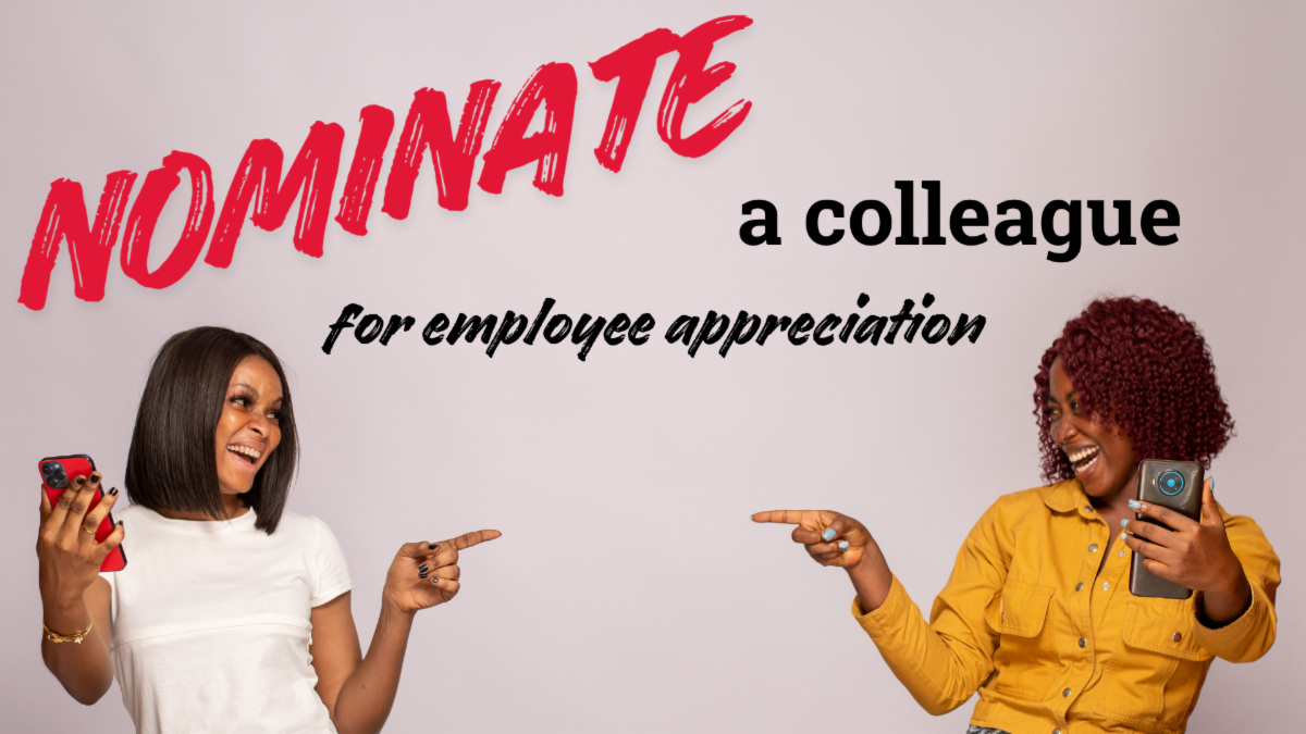 Nominate a colleague for employee appreciation. Two women looking happy pointing at one another with phones