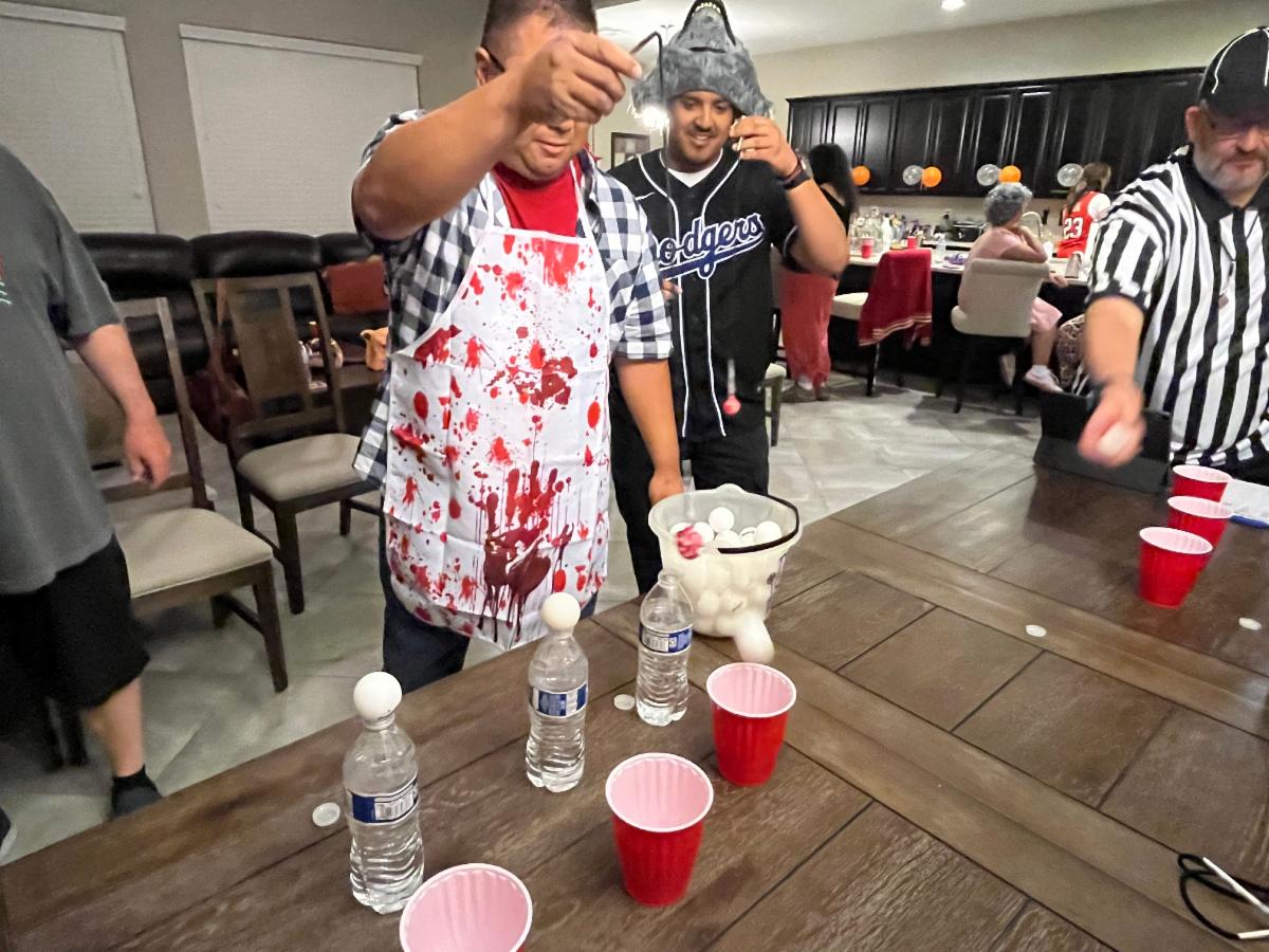 Carlos Perez Cesar Gudiel and Jeff LaGesse playing a Halloween game