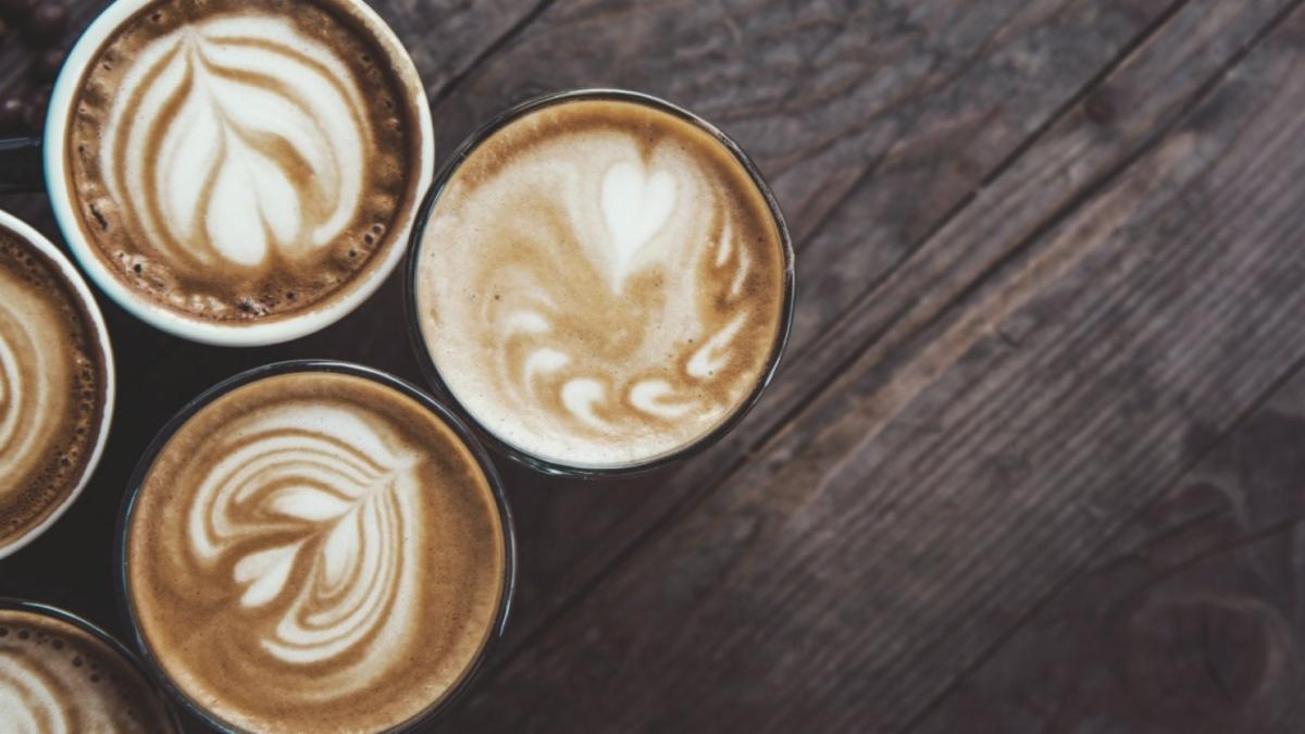 Espresso coffee cups on brown table. Coffee with the CFO event text includes upcoming dates and registration deadlines as listed in the article.