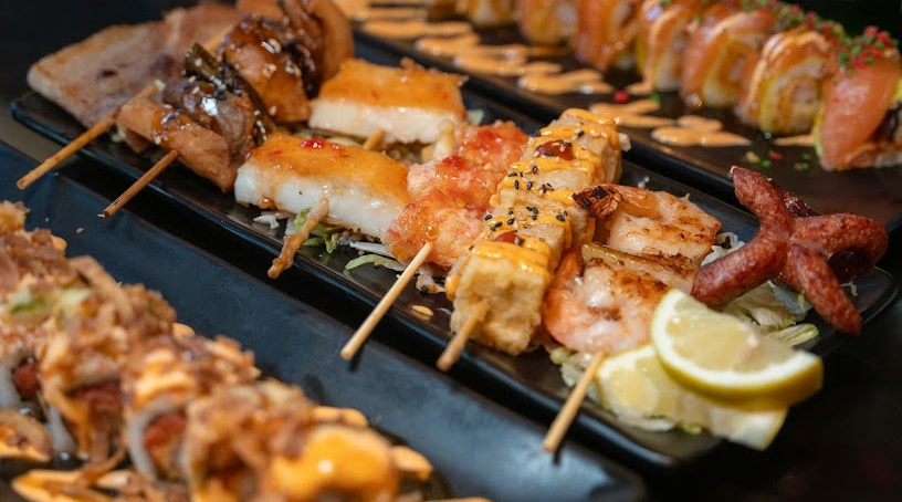 Sushi rolls and skewers from Sakana Sushi