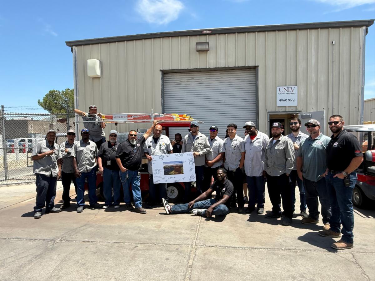 HVAC team in front of shop