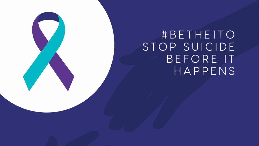Suicide awareness image with blue and purple suicide awareness ribbon. Text: Be the one to stop suicide before it happens 