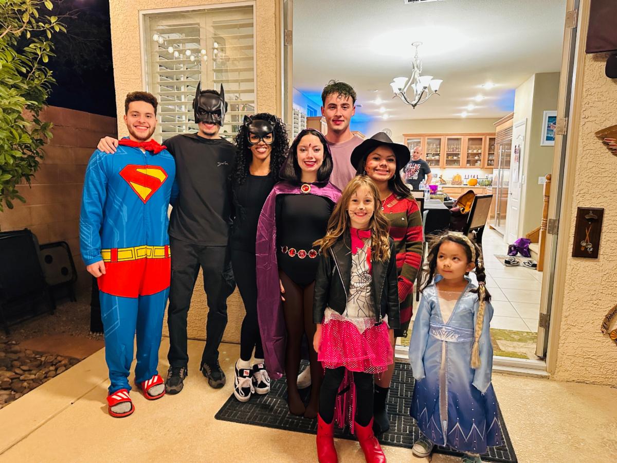 Nancy Mayorgae family dressed in a variety of Halloween costumes