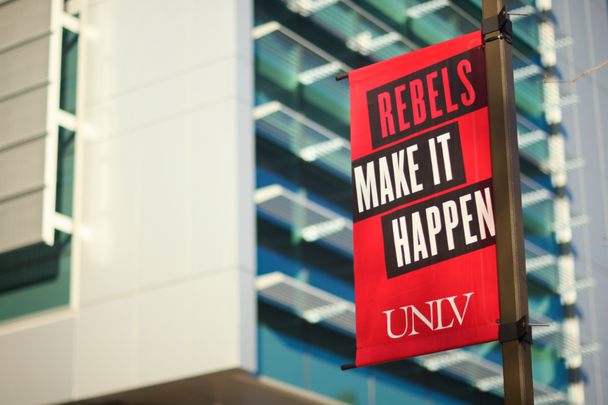 Rebels Make It Happen banner in front of building on UNLV campus