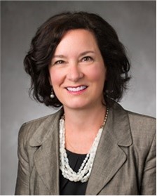 headshot of Commissioner Kunesh