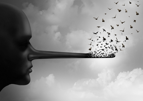 Stop corruption concept or spreading lies symbol as a person with a long nose that is being replaced by flying birds as a metaphor for honesty and communicating rumors in a 3D illustration style.