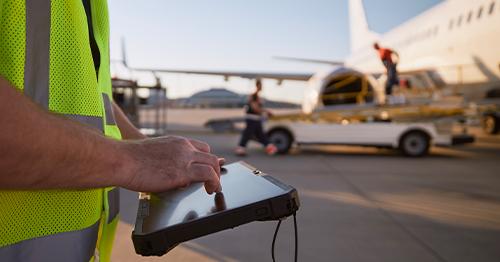 ground crew preparing airplane before flight