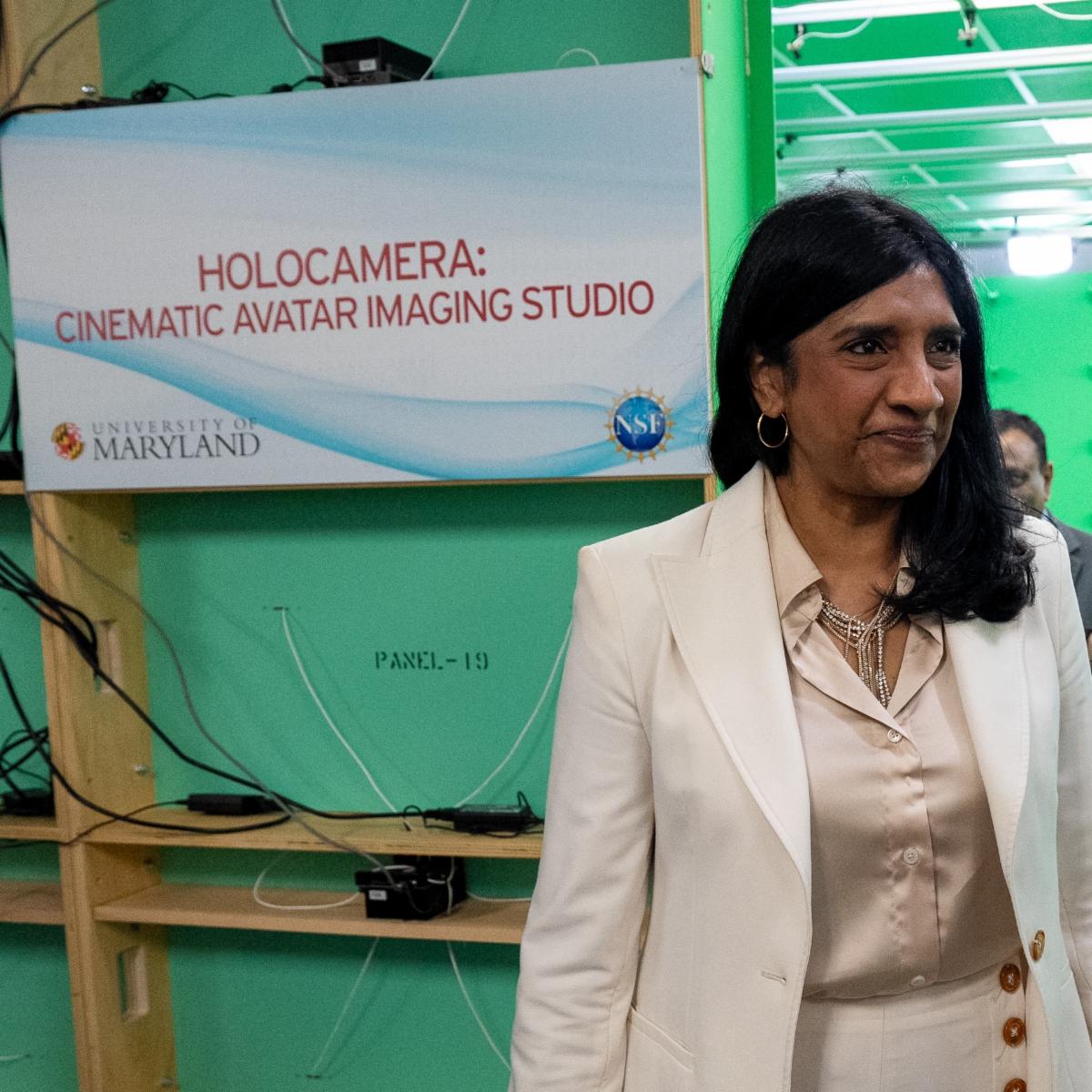 Aruna Miller in front of green holocamera studio