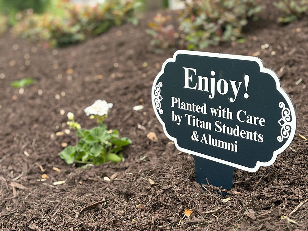 Planted by Titan Students sign