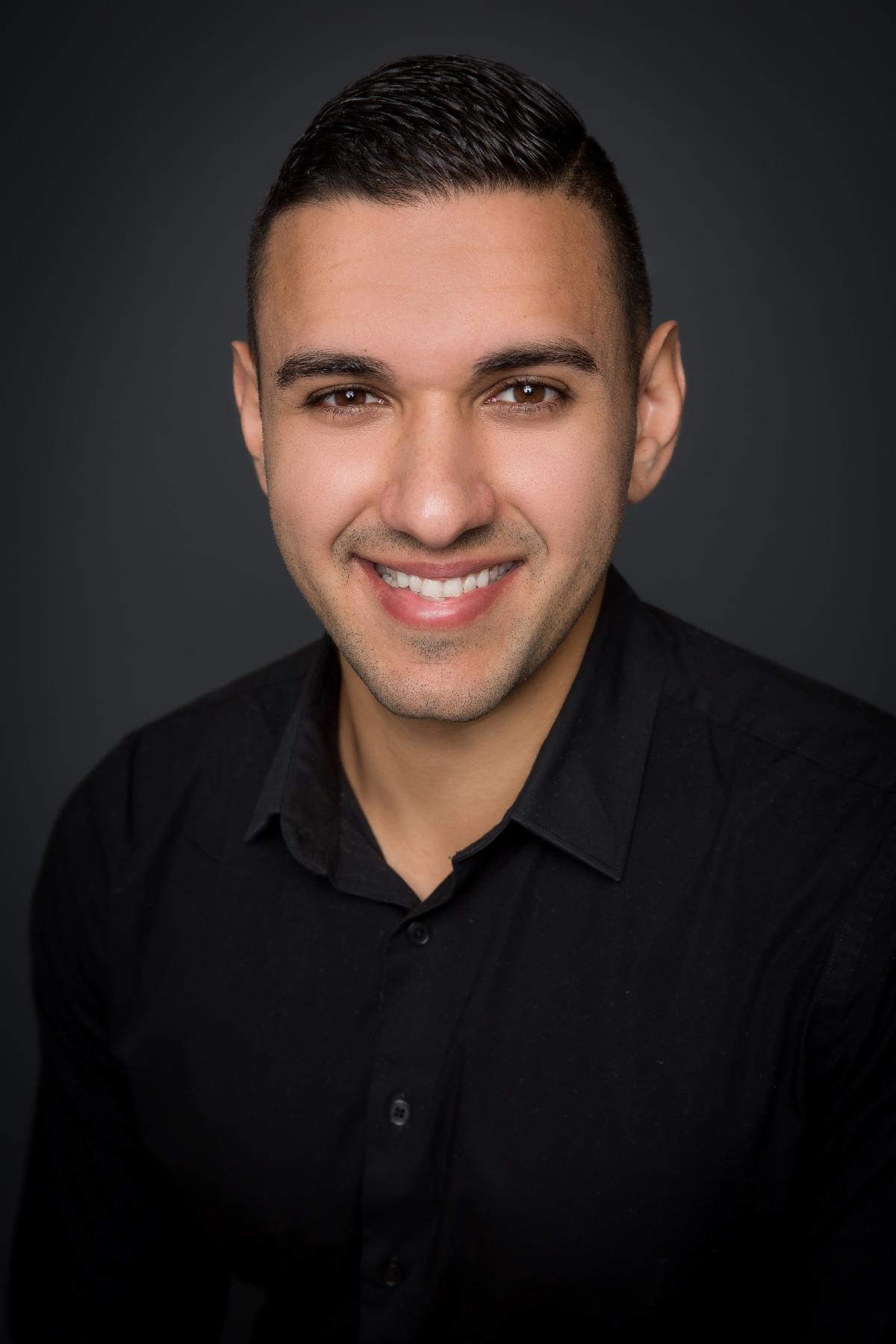 Headshot_Husein Sharaf resize.jpg