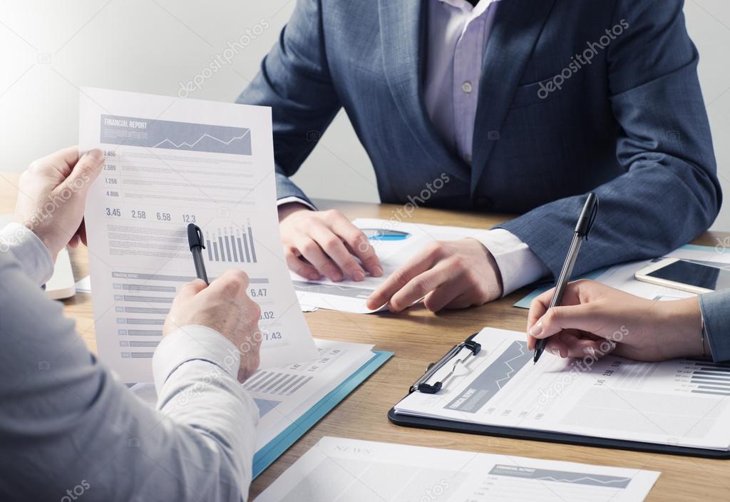 Finance professional sharing a report.