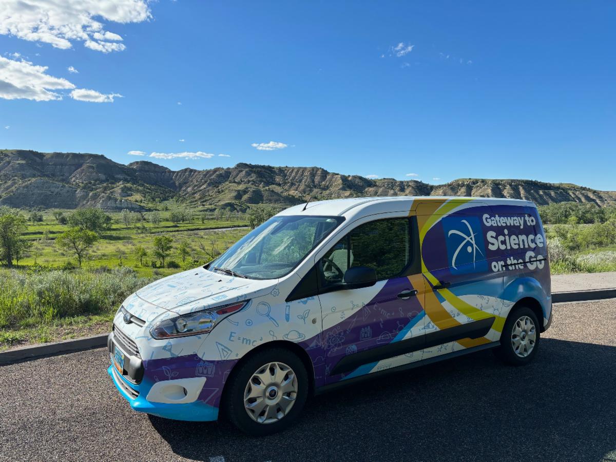 picture of the gateway to science van in front of some scenery