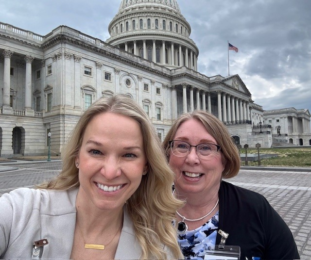 dawn and lori in front of the united states capitol building