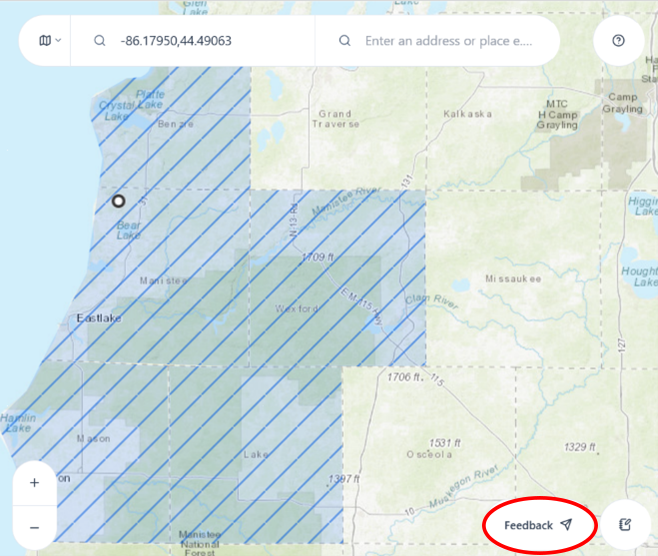 A digital map interface of the MITripPlanner tool showing a search bar at the top and a feedback button highlighted in the lower right corner.