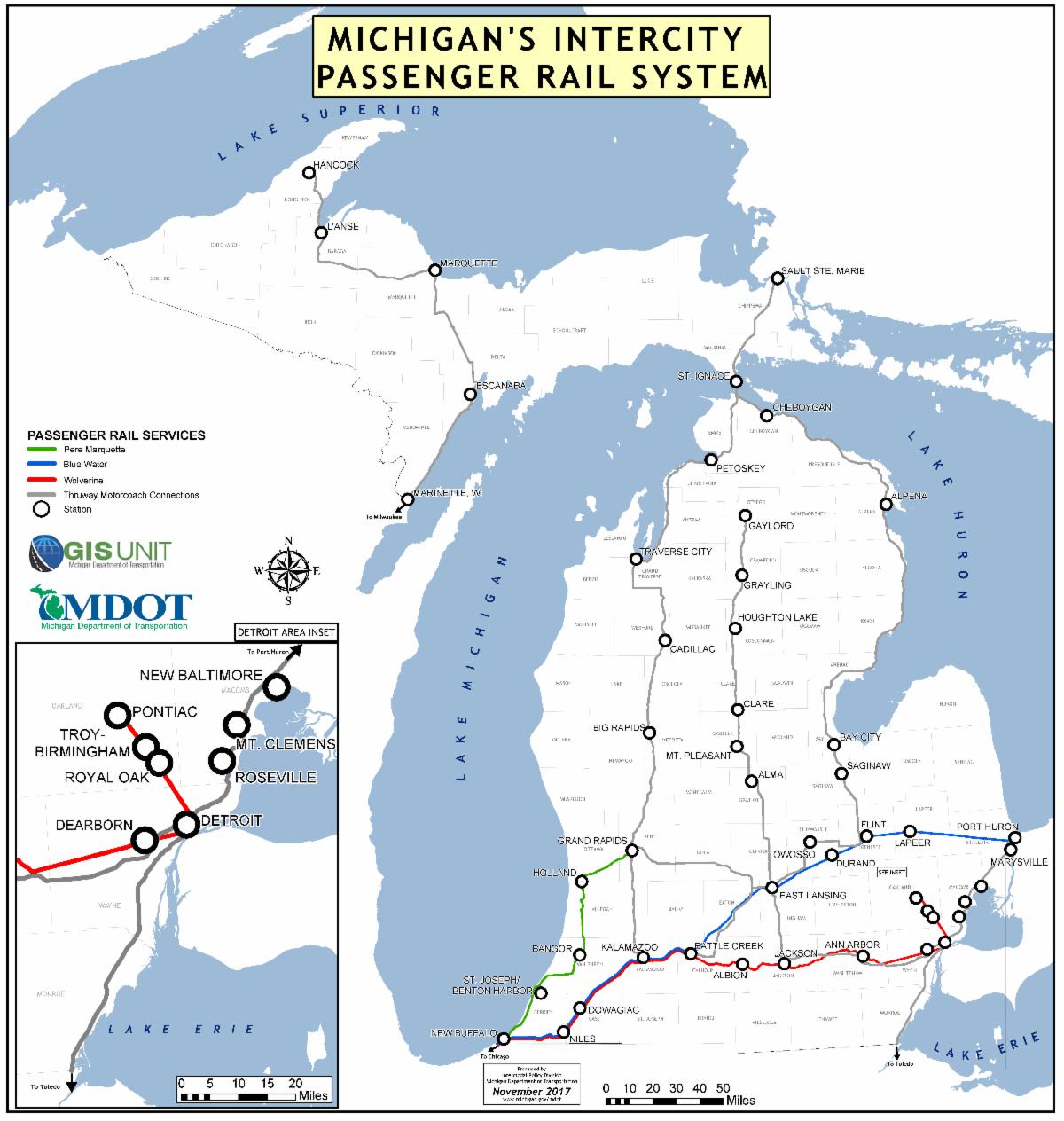 Map of Michigan's intercity passenger rail system showing the three passenger rail routes and their station stops. The Pere Marquette route from Chicago to Grand Rapids  is shown in green, the Blue Water route from Chicago to Port Huron is shown in blue, and the Wolverine route from Chicago to Detroit/Pontiac is shown in red. The map also shows the thruway motorcoach connections throughout Michigan in gray .