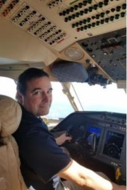 Lt. Laszlo Bartha in aircraft cockpit