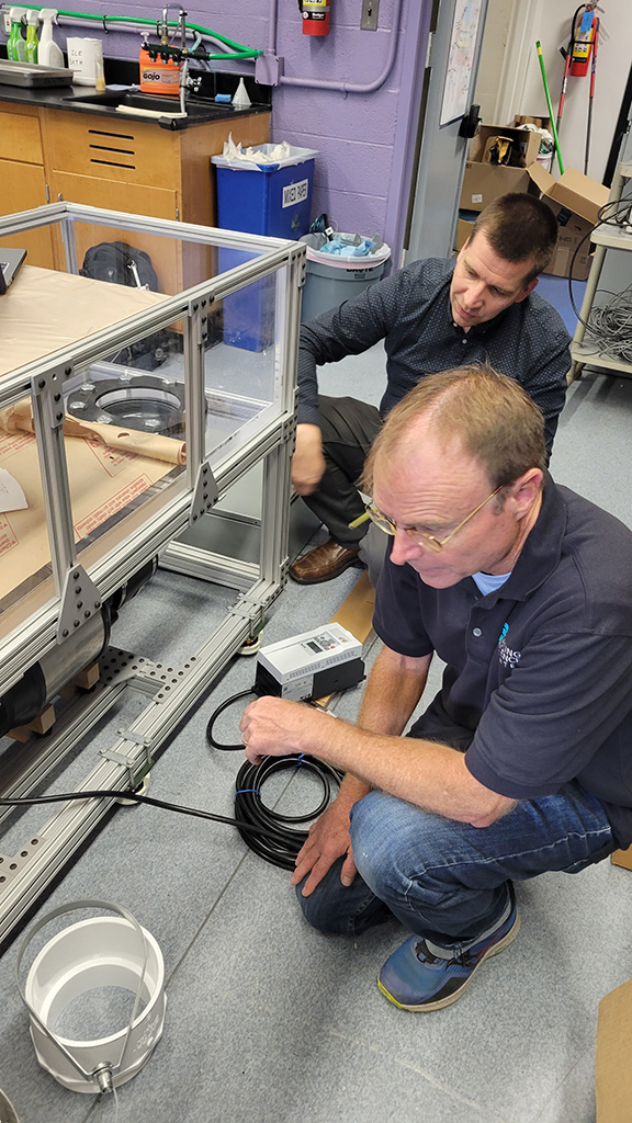 Fred and Simo planning the installation of the Flow Loop electrical control.